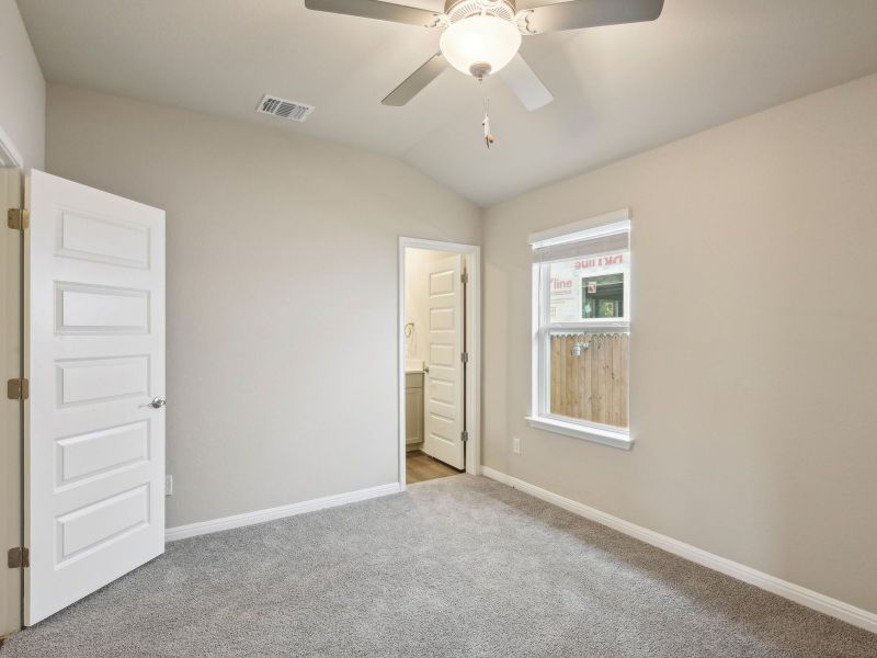 The third secondary bedroom has its own connected bathroom.