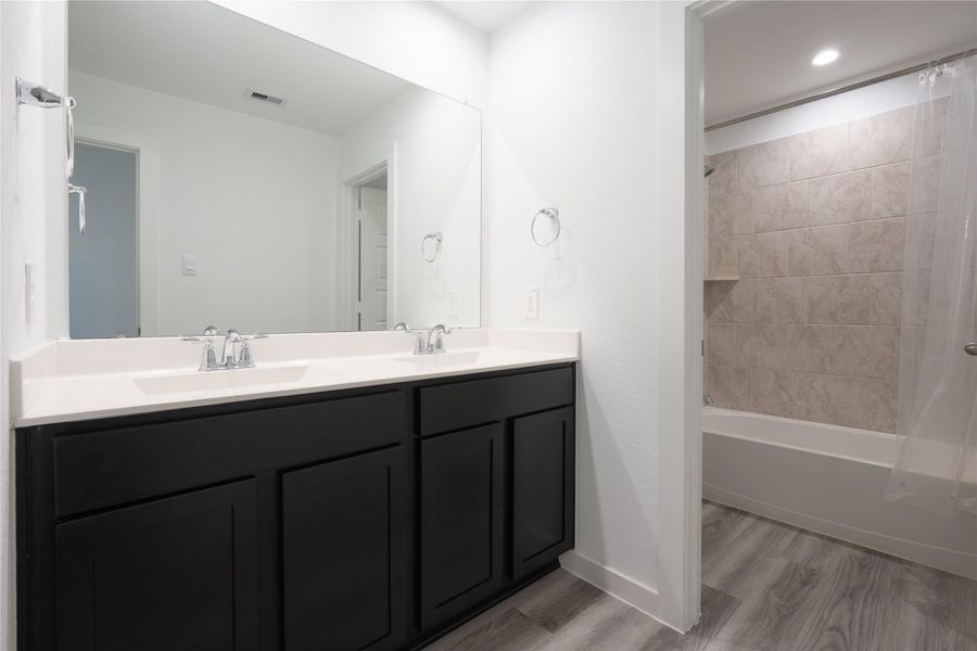 Furnished interior view inside a new home in City Gate, Houston (Image 6).