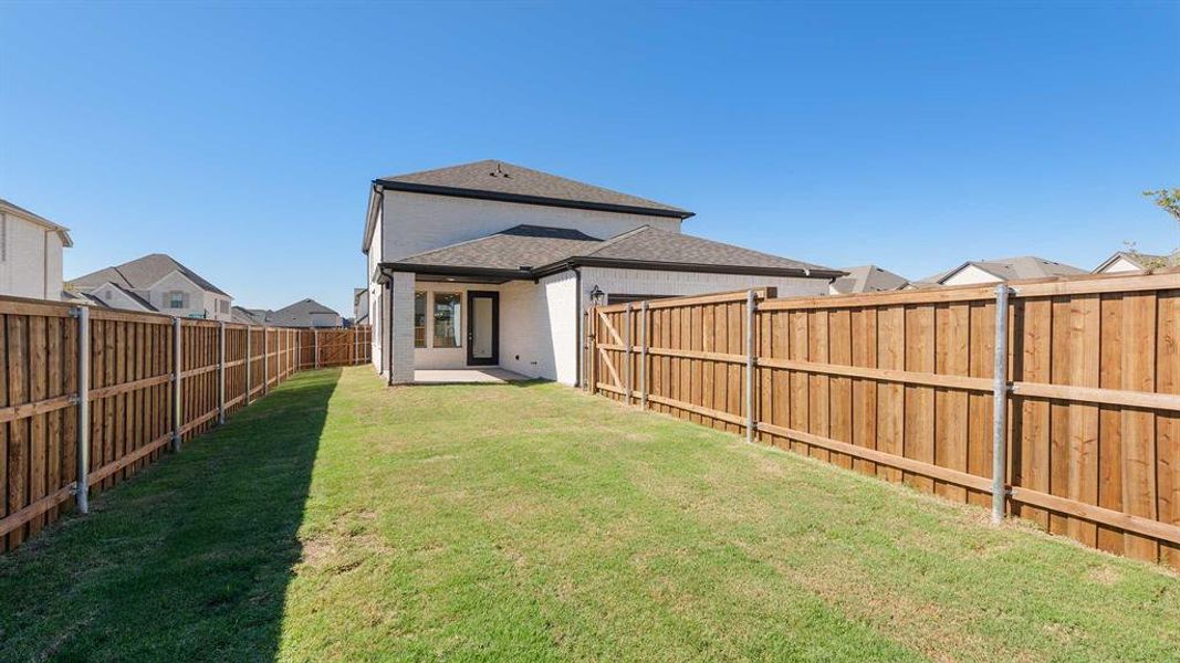 Exterior details and patio area of a home in The Parks At Wilson Creek 40', Celina (Image 2).