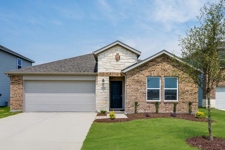 Front exterior of a new home in River Ridge, Crandall, TX, highlighting curb appeal (Image 1). Front exterior of a new home in River Ridge, Crandall, TX, highlighting curb appeal (Image 1).