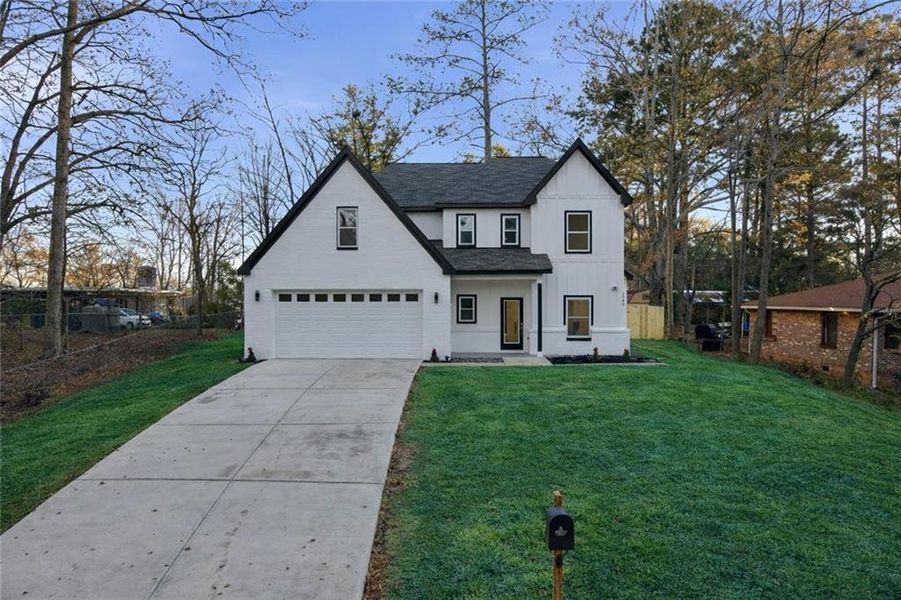 Front exterior of a new home in , Conyers, GA, highlighting curb appeal (Image 27).