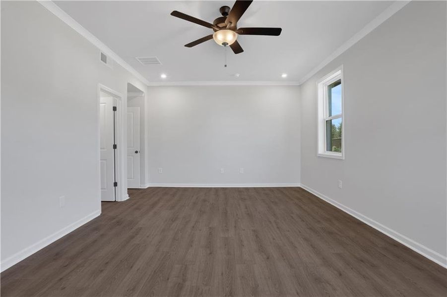 Spacious, unfurnished interior of a new home in The Paddocks at Doc Hughes, Buford (Image 53).