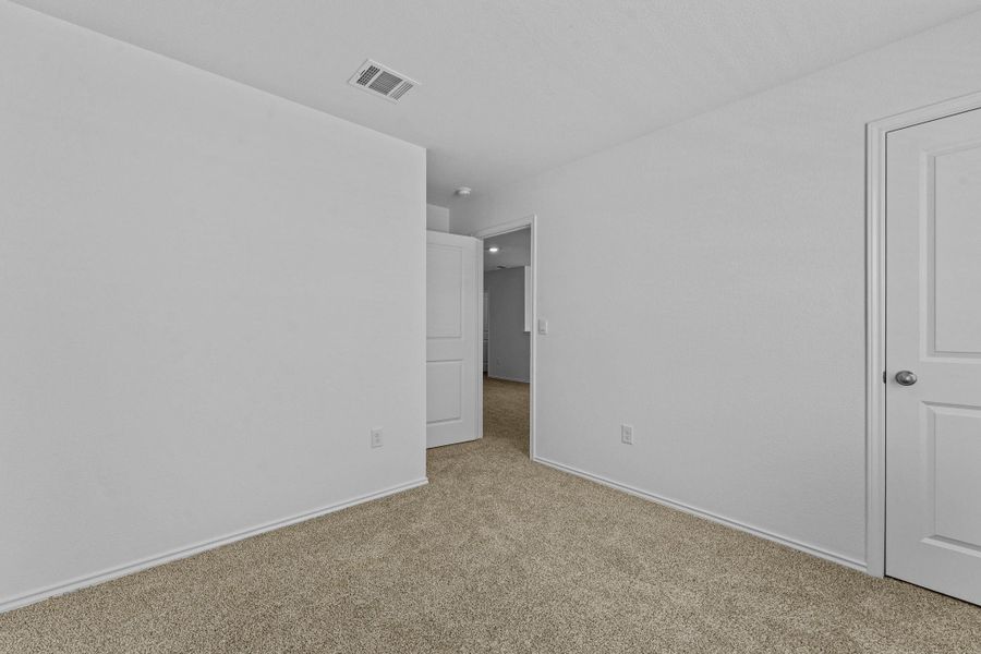 Spacious, unfurnished interior of a new home in Prairie Lakes, Buda (Image 30).