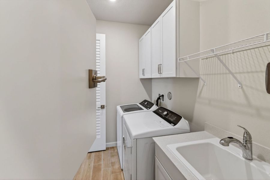 Furnished interior view inside a new home in Del Webb Tradition, Port St. Lucie (Image 43).