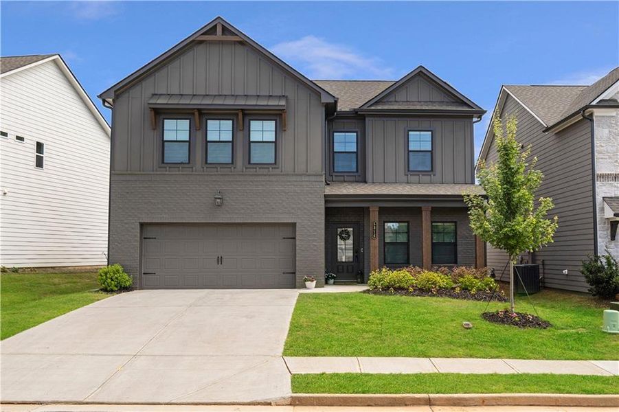 Front exterior of a new home in , Gainesville, GA, highlighting curb appeal (Image 1). Front exterior of a new home in , Gainesville, GA, highlighting curb appeal (Image 1).