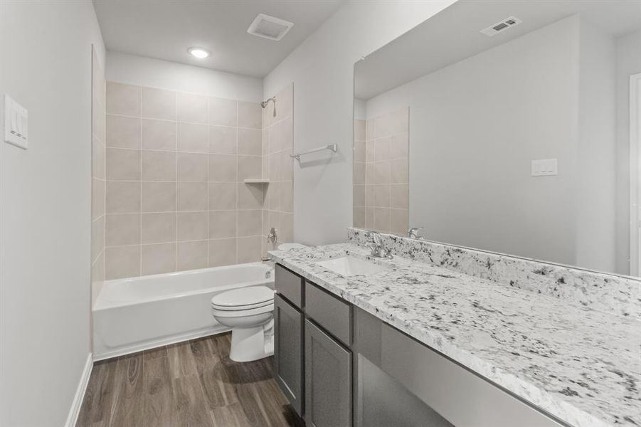 Furnished interior view inside a new home in Rocky Creek Crossing, Crowley (Image 8).