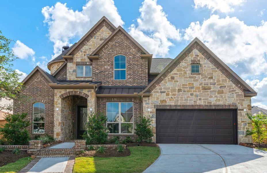 Representative exterior photo of a completed home built from the 3799 by Ravenna Homes in Cross Creek West, Fulshear, TX (Image 25). Representative exterior photo of a completed home built from the 3799 by Ravenna Homes in Cross Creek West, Fulshear, TX (Image 25).