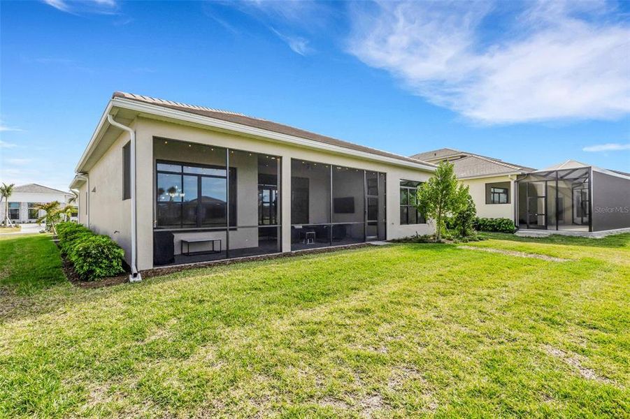 Exterior details and patio area of a home in Artistry Sarasota, Sarasota (Image 31).