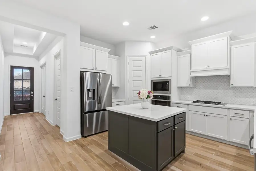 Furnished interior view inside a new home in Meridiana 40'/45', Manvel (Image 10).