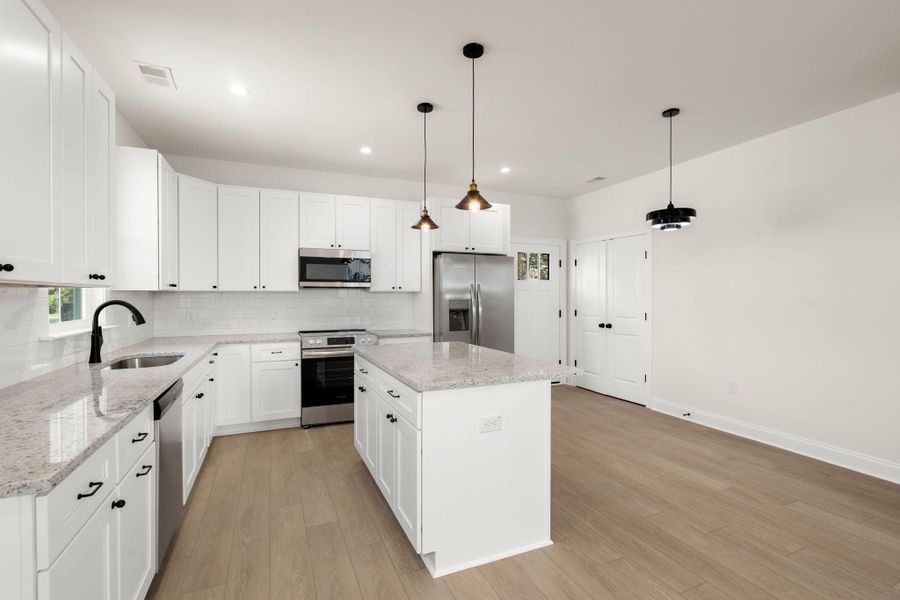 Furnished interior view inside a new home in , North Charleston (Image 10).