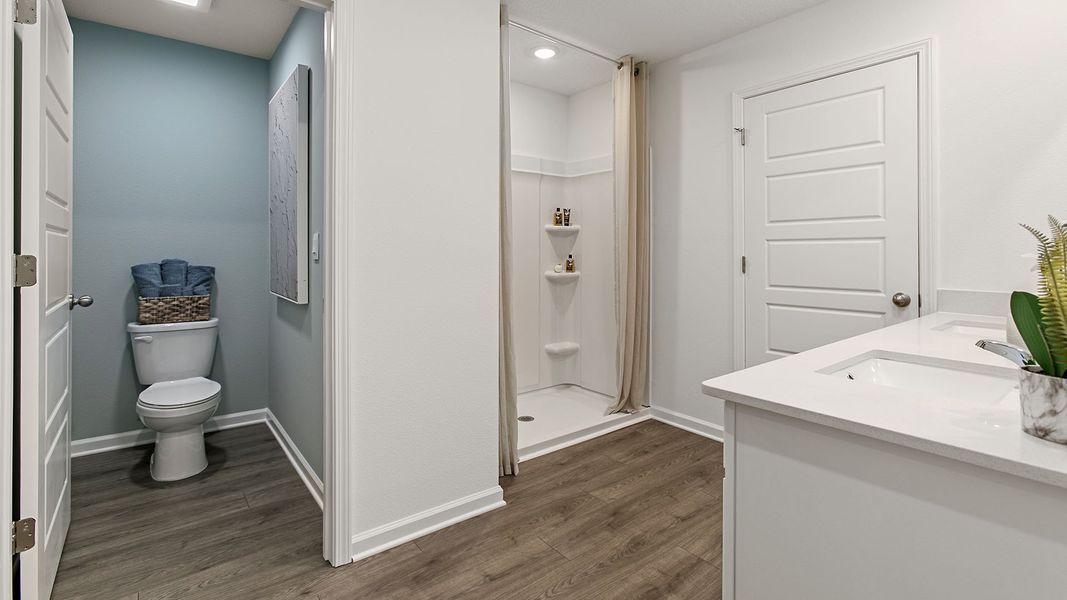 Representative furnished interior of a home built from the HAYDEN II by D.R. Horton in Copes Landing, Jacksonville (Image 22).