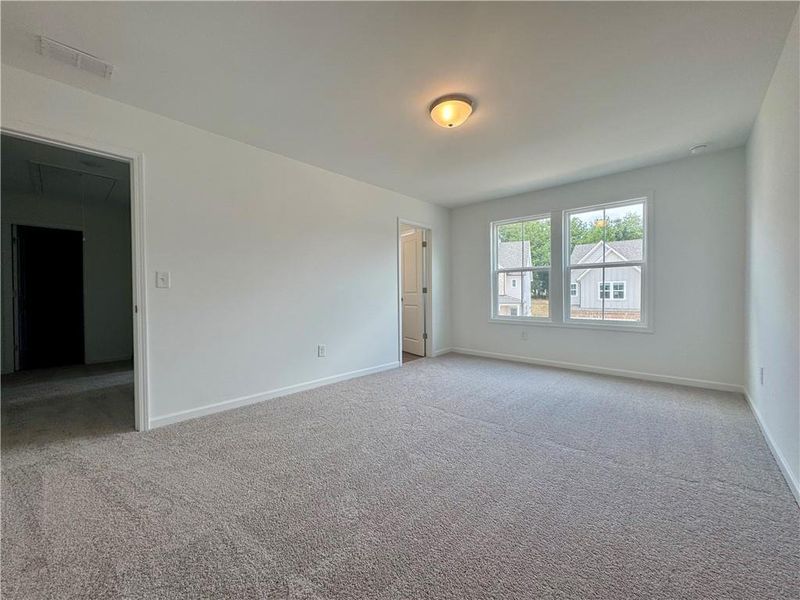 Spacious, unfurnished interior of a new home in Eastlyn Crossing - Single Family, Flowery Branch (Image 50). Spacious, unfurnished interior of a new home in Eastlyn Crossing - Single Family, Flowery Branch (Image 50).