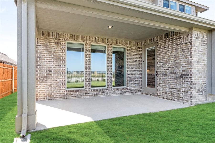 Exterior details and patio area of a home in Timberbrook 3B-4A, Justin (Image 16). Exterior details and patio area of a home in Timberbrook 3B-4A, Justin (Image 16).