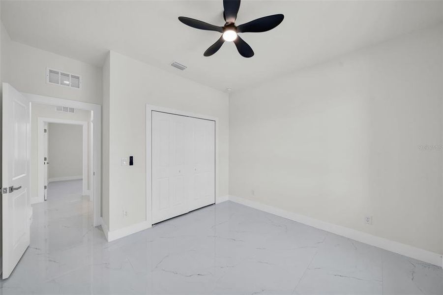 Spacious, unfurnished interior of a new home in , Port Charlotte (Image 27).