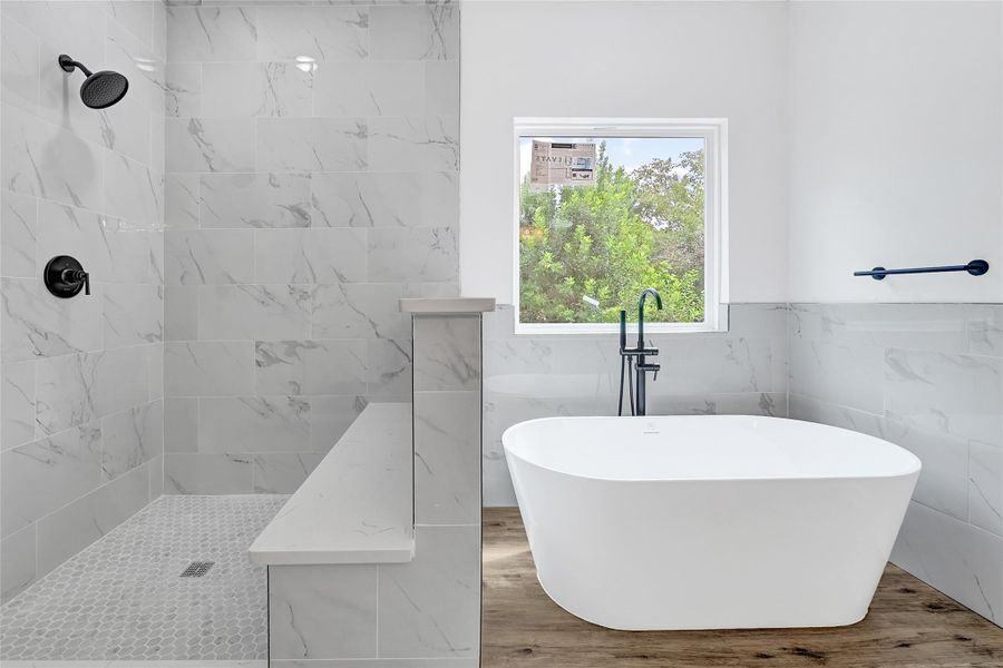 Spa-like tub perfect for unwinding. Spa-like tub perfect for unwinding.