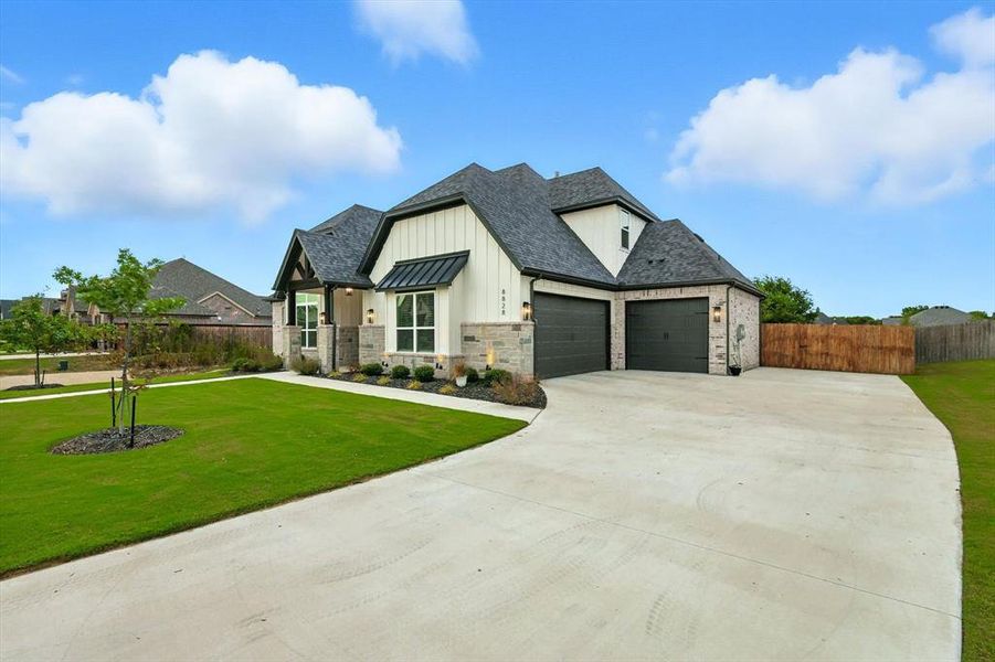 Front exterior of a new home in , Justin, TX, highlighting curb appeal (Image 23). Front exterior of a new home in , Justin, TX, highlighting curb appeal (Image 23).