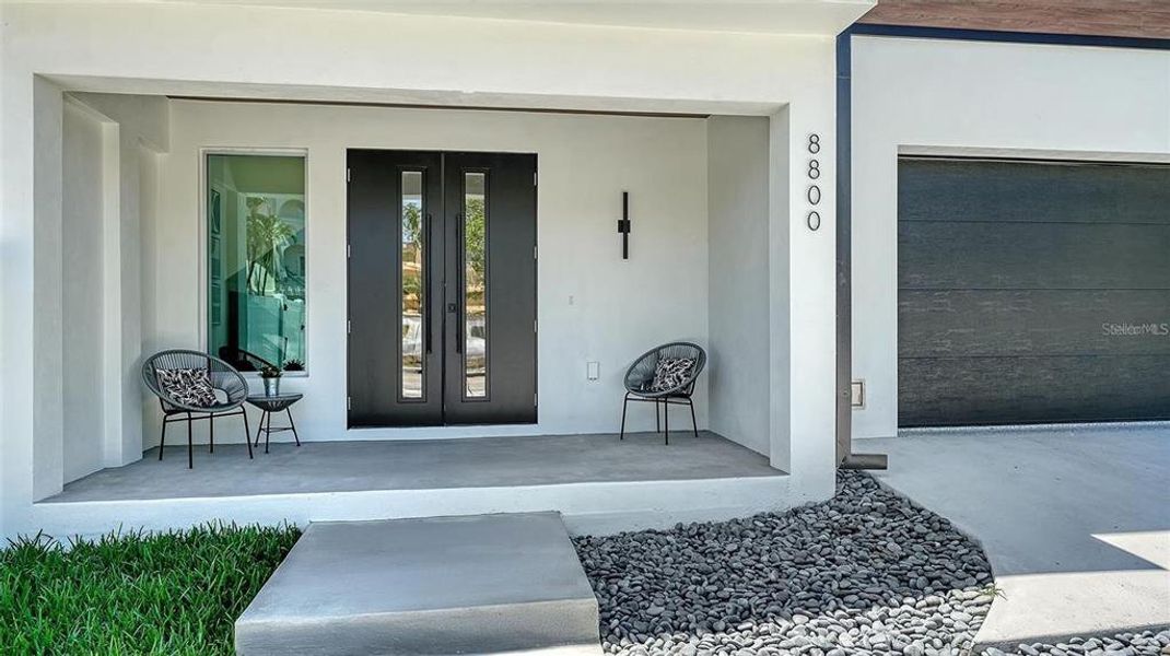 Exterior details and patio area of a home in , Sarasota (Image 25).
