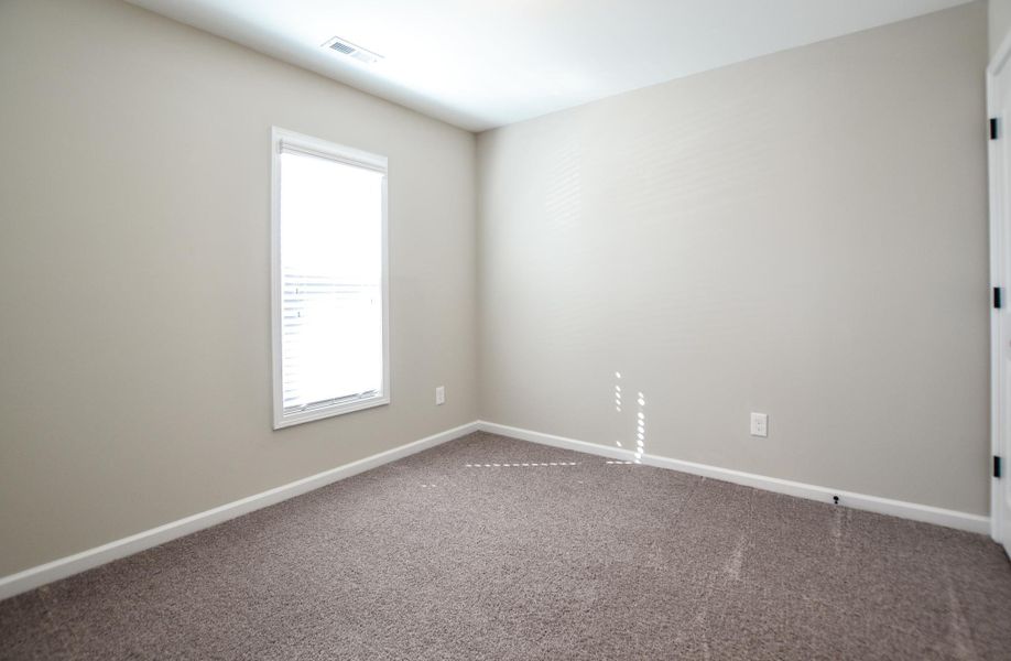Representative unfurnished interior of a home built from the Yosemite by RiverWILD Homes in Sawyer Ridge, Dunn (Image 18).