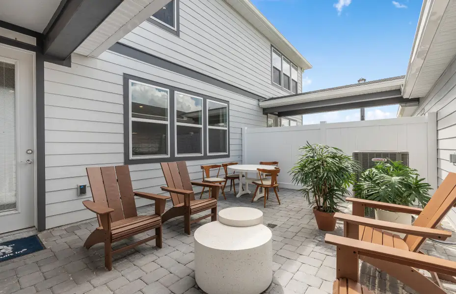 Exterior details and patio area of a home in EverBe, Orlando (Image 3). Exterior details and patio area of a home in EverBe, Orlando (Image 3).