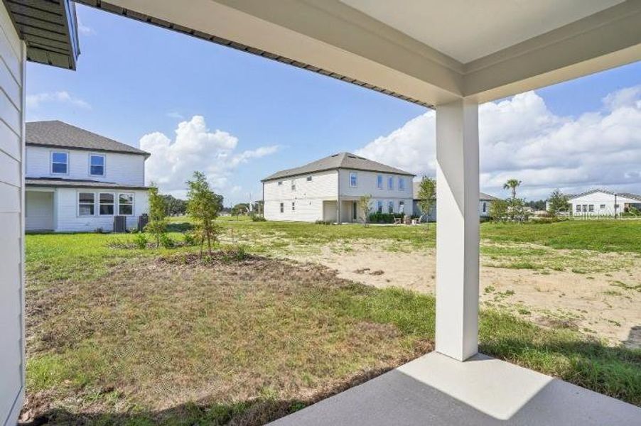 Exterior details and patio area of a home in Trailside, Mount Dora (Image 3). Exterior details and patio area of a home in Trailside, Mount Dora (Image 3).