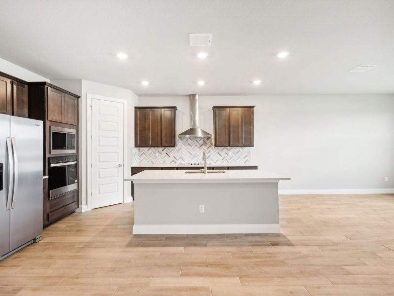 Kitchen in the Jade floorplan at 6358 Sweetwood Drive