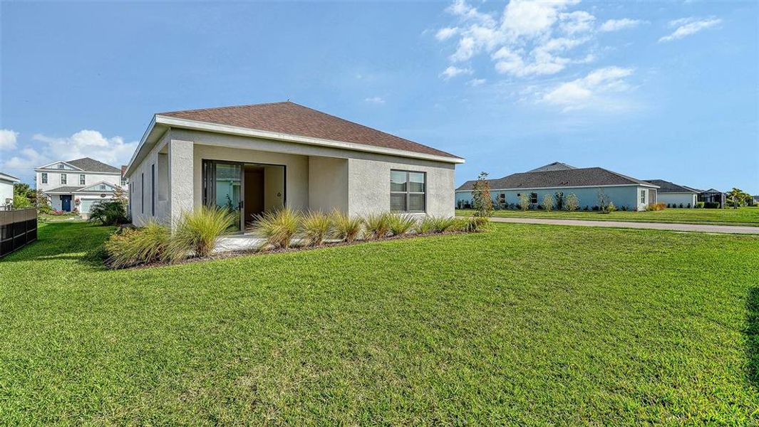 Exterior details and patio area of a home in Canoe Creek, Parrish (Image 4).