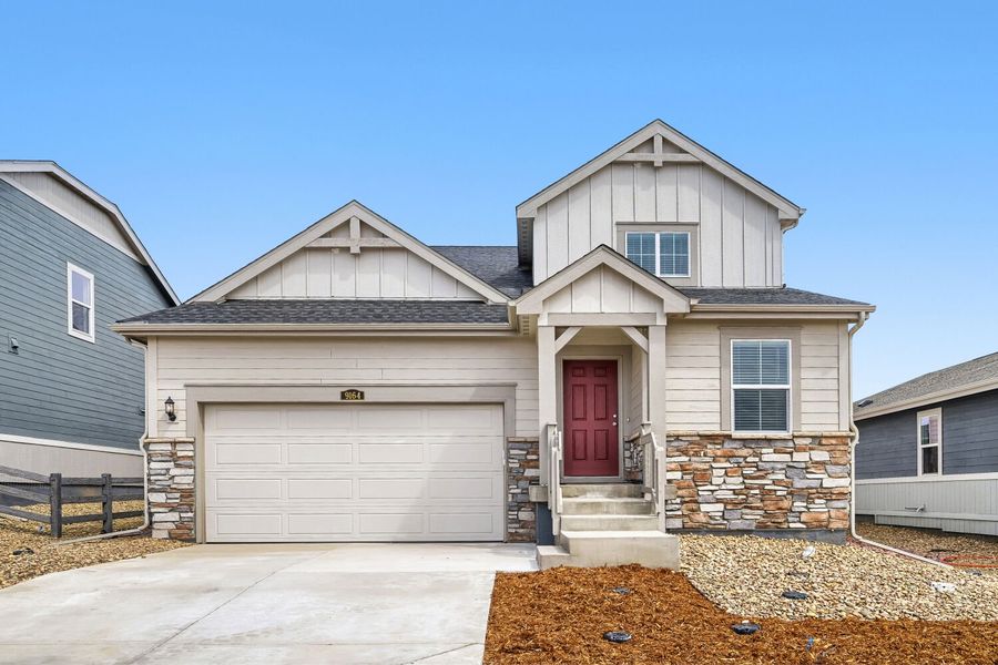 Front exterior of a new home in Percheron, Colorado Springs, CO, highlighting curb appeal (Image 1). Front exterior of a new home in Percheron, Colorado Springs, CO, highlighting curb appeal (Image 1).