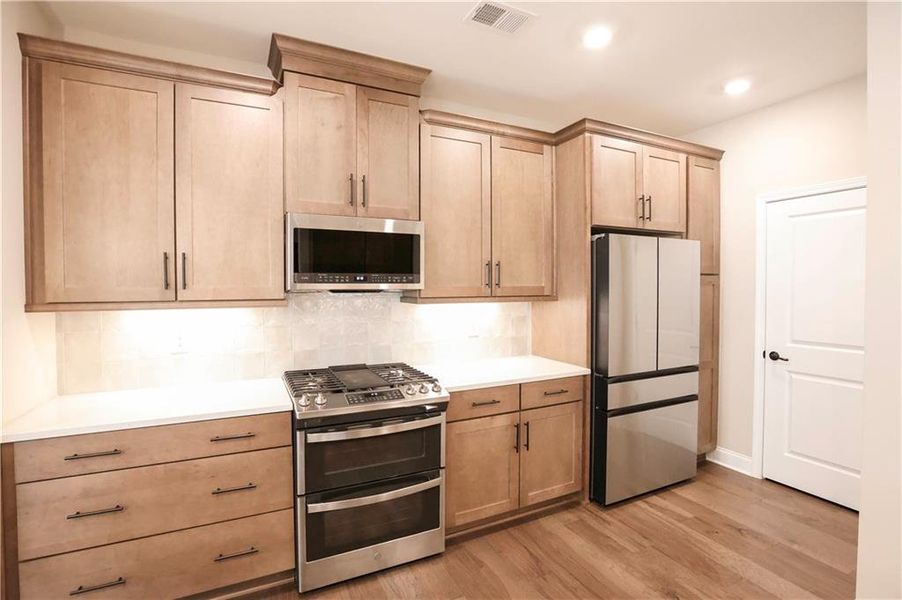 Furnished interior view inside a new home in , Cumming (Image 10). Furnished interior view inside a new home in , Cumming (Image 10).