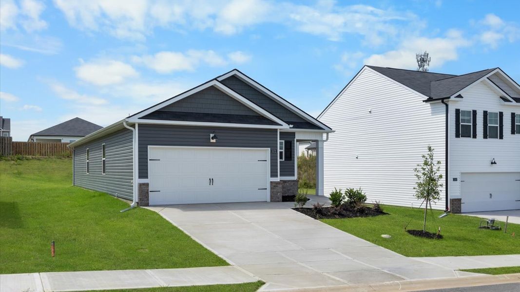 Front exterior of a new home in Captain's Corner, Grovetown, GA, highlighting curb appeal (Image 16). Front exterior of a new home in Captain's Corner, Grovetown, GA, highlighting curb appeal (Image 16).