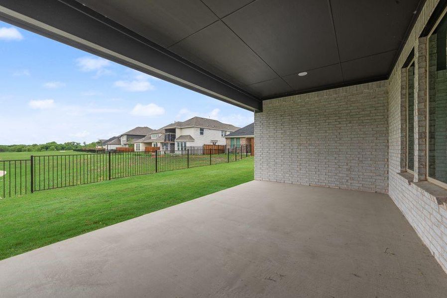 Exterior details and patio area of a home in Valencia On The Lake, Little Elm (Image 4).