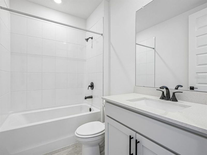 Furnished interior view inside a new home in Two Rivers - Signature Series, Zephyrhills (Image 9).