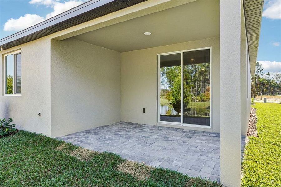 Exterior details and patio area of a home in Ridgehaven - Villas, Ormond Beach (Image 28).