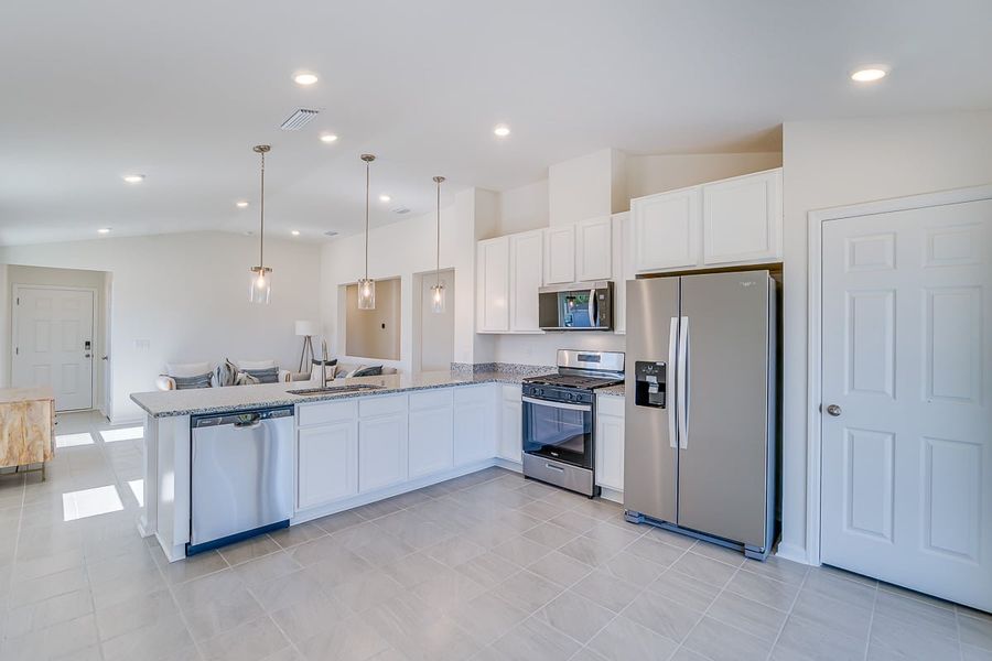 Furnished interior view inside a new home in Somerset - Classic Series, Palm Coast (Image 4).