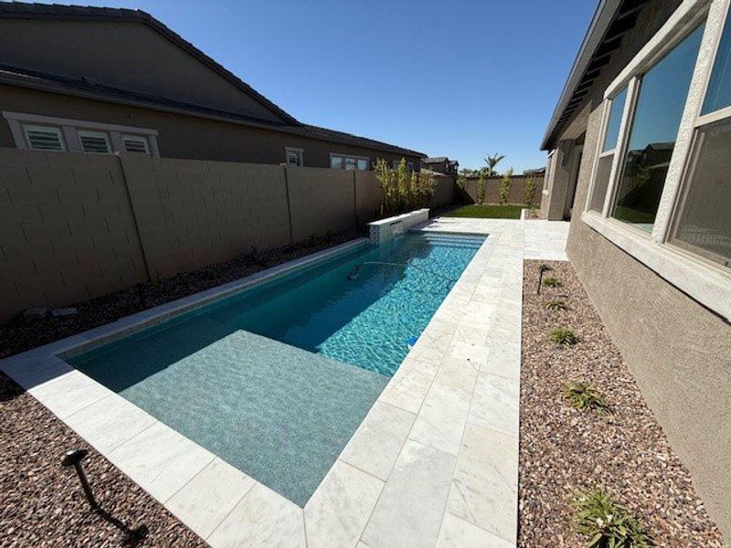 Exterior details and patio area of a home in Elegance at Eastmark, Mesa (Image 29).