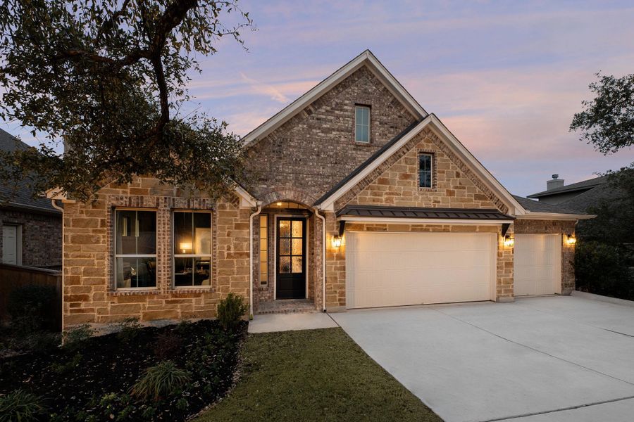 Representative exterior photo of a completed home built from the Alexander II by Ashton Woods in Sunday Creek at Kinder Ranch, San Antonio, TX (Image 22).