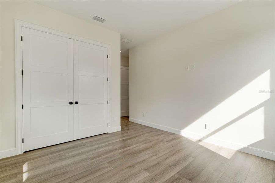 Spacious, unfurnished interior of a new home in , New Smyrna Beach (Image 40).