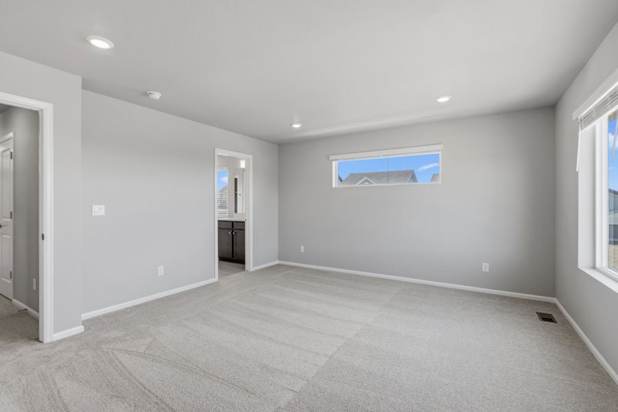 Spacious, unfurnished interior of a new home in Woodrose at Painted Prairie, Aurora (Image 13).