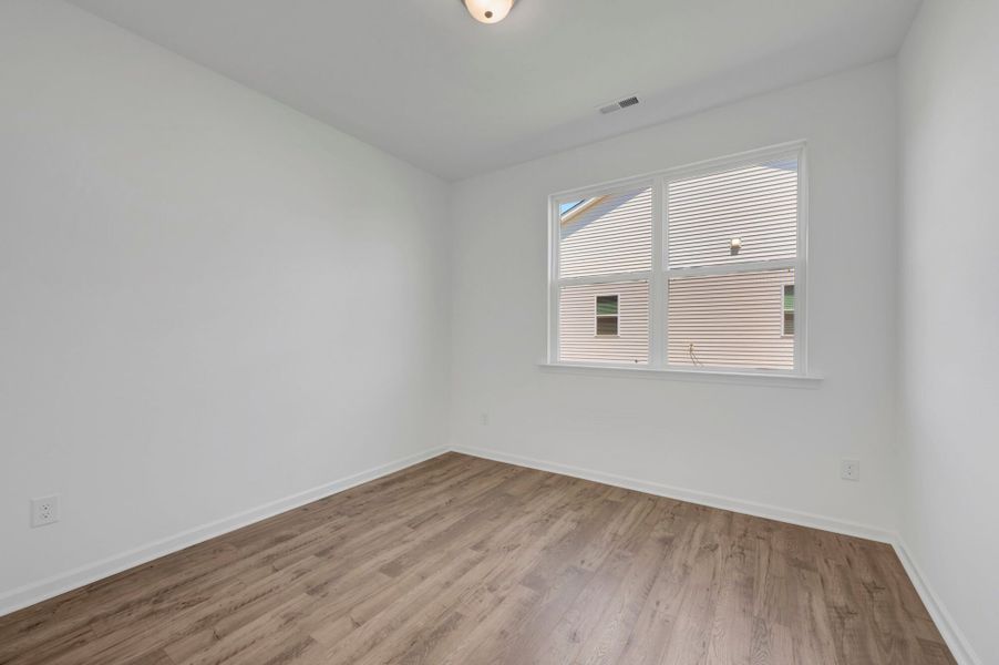 Spacious, unfurnished interior of a new home in Providence Creek, Fuquay Varina (Image 10).
