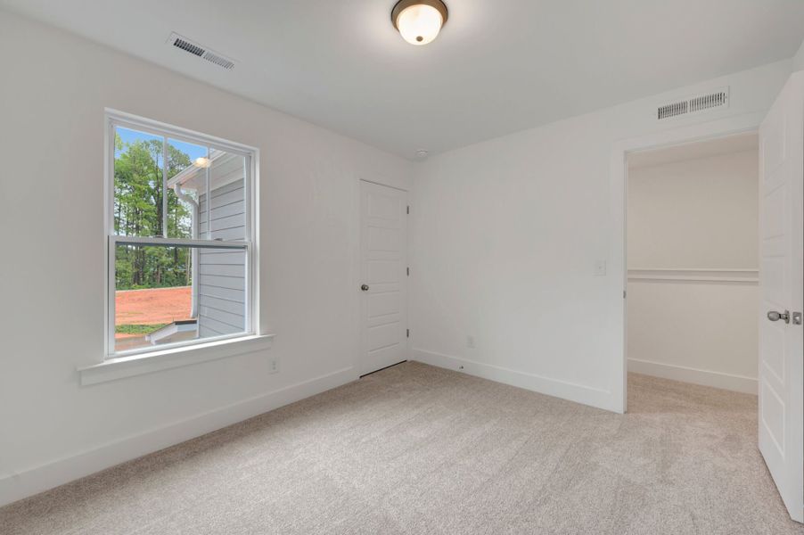 Spacious, unfurnished interior of a new home in Ashmore Townes, Garner (Image 27). Spacious, unfurnished interior of a new home in Ashmore Townes, Garner (Image 27).