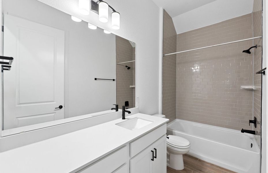 Furnished interior view inside a new home in Bluffview Reserve, Leander (Image 14).