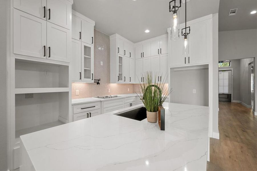 Unfurnished living room featuring a glass covered fireplace, dark wood finished floors, lofted ceiling, recessed lighting, and a ceiling fan Unfurnished living room featuring a glass covered fireplace, dark wood finished floors, lofted ceiling, recessed lighting, and a ceiling fan