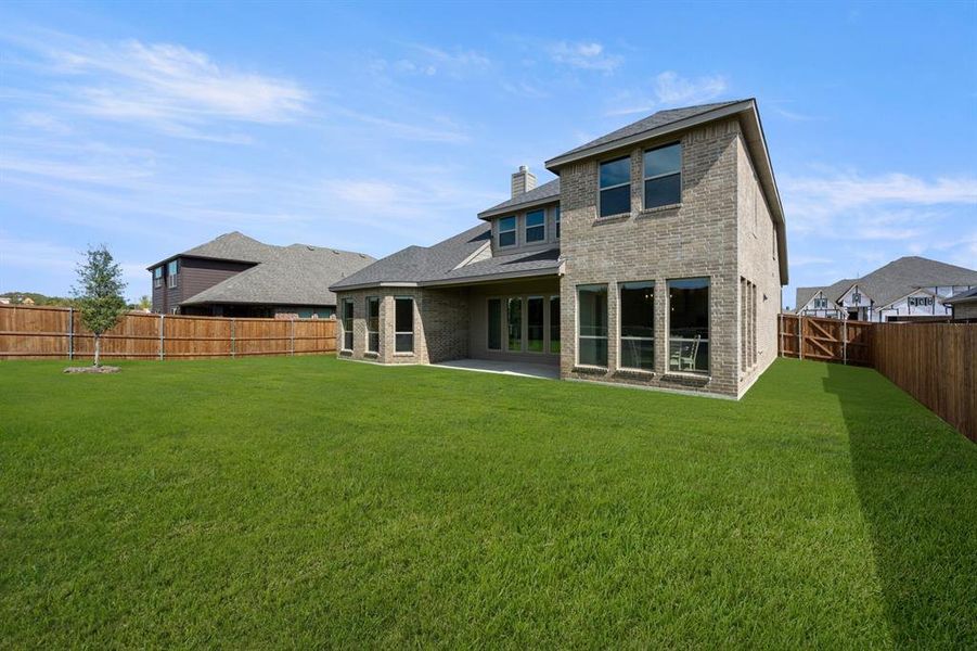 Exterior details and patio area of a home in Somerset - Phase 5, Mansfield (Image 2). Exterior details and patio area of a home in Somerset - Phase 5, Mansfield (Image 2).