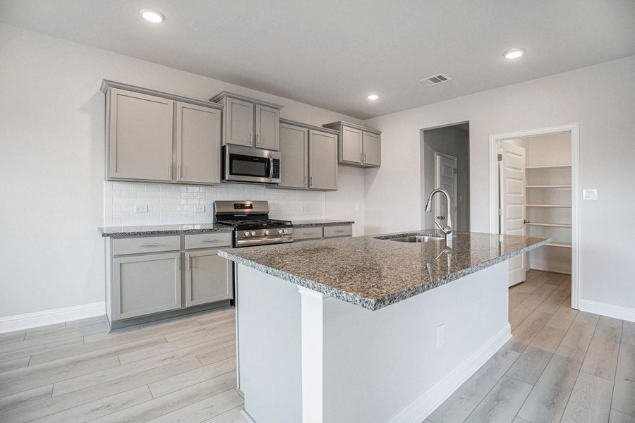 Furnished interior view inside a new home in Bayou Maison, Dickinson (Image 3).