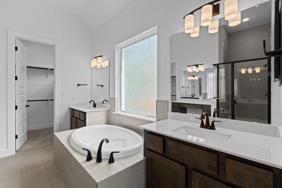 Primary Bath retreat with dual vanities & garden tub