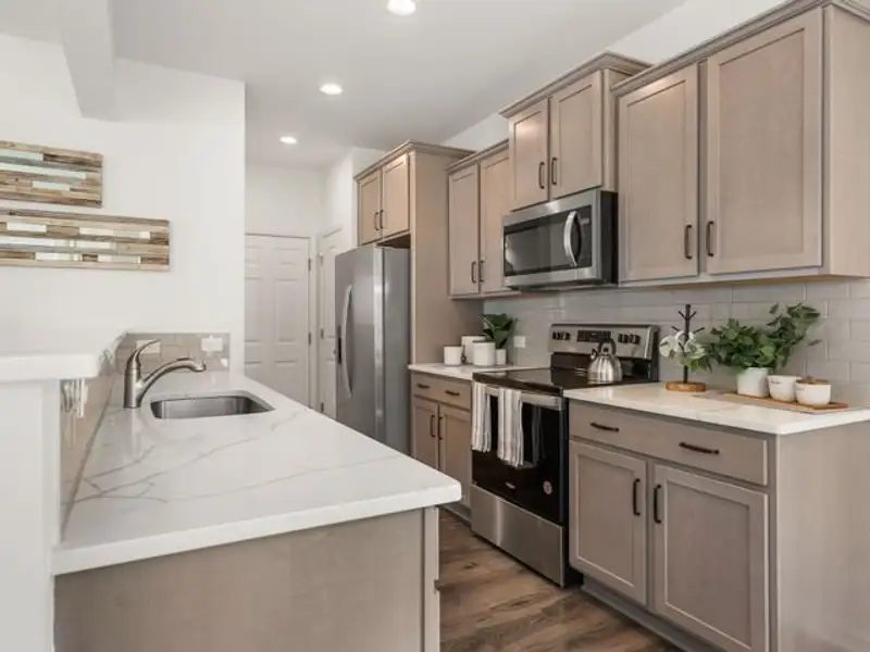 Representative furnished interior of a home built from the Baxter by True Homes in Oaks at St Martin, Oakboro (Image 3).