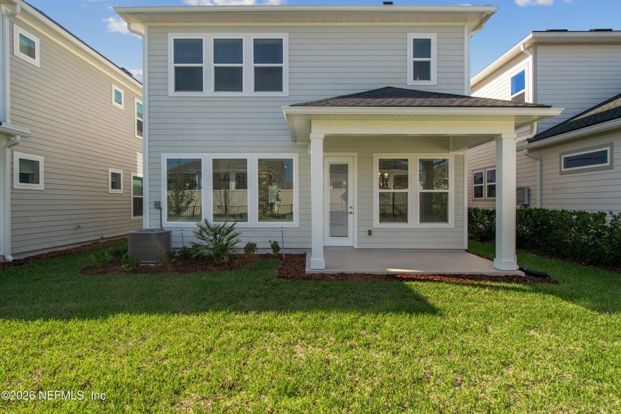 Exterior details and patio area of a home in Granville at eTown 38', Jacksonville (Image 3).