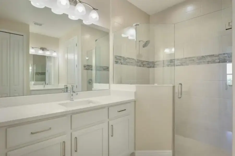 Representative furnished interior of a home built from the Boca Grande by Medallion Home in Reflection Villas at Watercolor Place, Bradenton (Image 8).