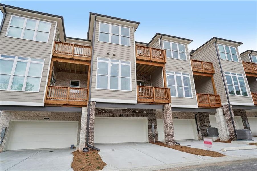 In-progress construction of a new home in Ward's Crossing Townhomes, Johns Creek, GA (Image 30).