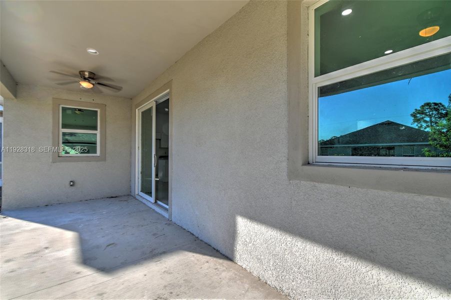 Exterior details and patio area of a home in , Lehigh Acres (Image 24). Exterior details and patio area of a home in , Lehigh Acres (Image 24).