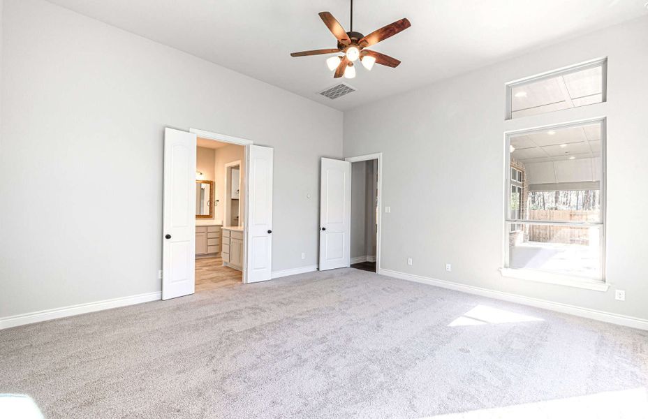 Representative unfurnished interior of a home built from the 3358 by Ravenna Homes in Artavia 70′, Conroe (Image 45).